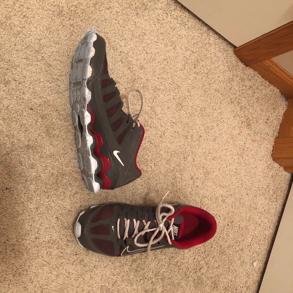 Gray and Red Nike shoes size 9.5